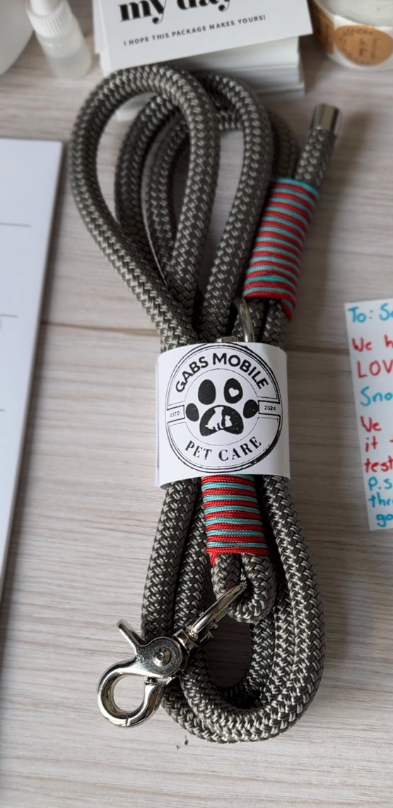 Handmade grey Snout & About leash with custom colours and safety clasp, crafted from durable marine rope – Gabs Mobile Pet Care
